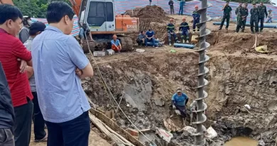 Vietnam rescuers try to save boy, 10, trapped in concrete pile
