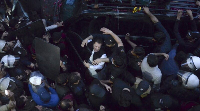 Imran Khan marks court presence as former Pakistan leader’s supporters clash with police
